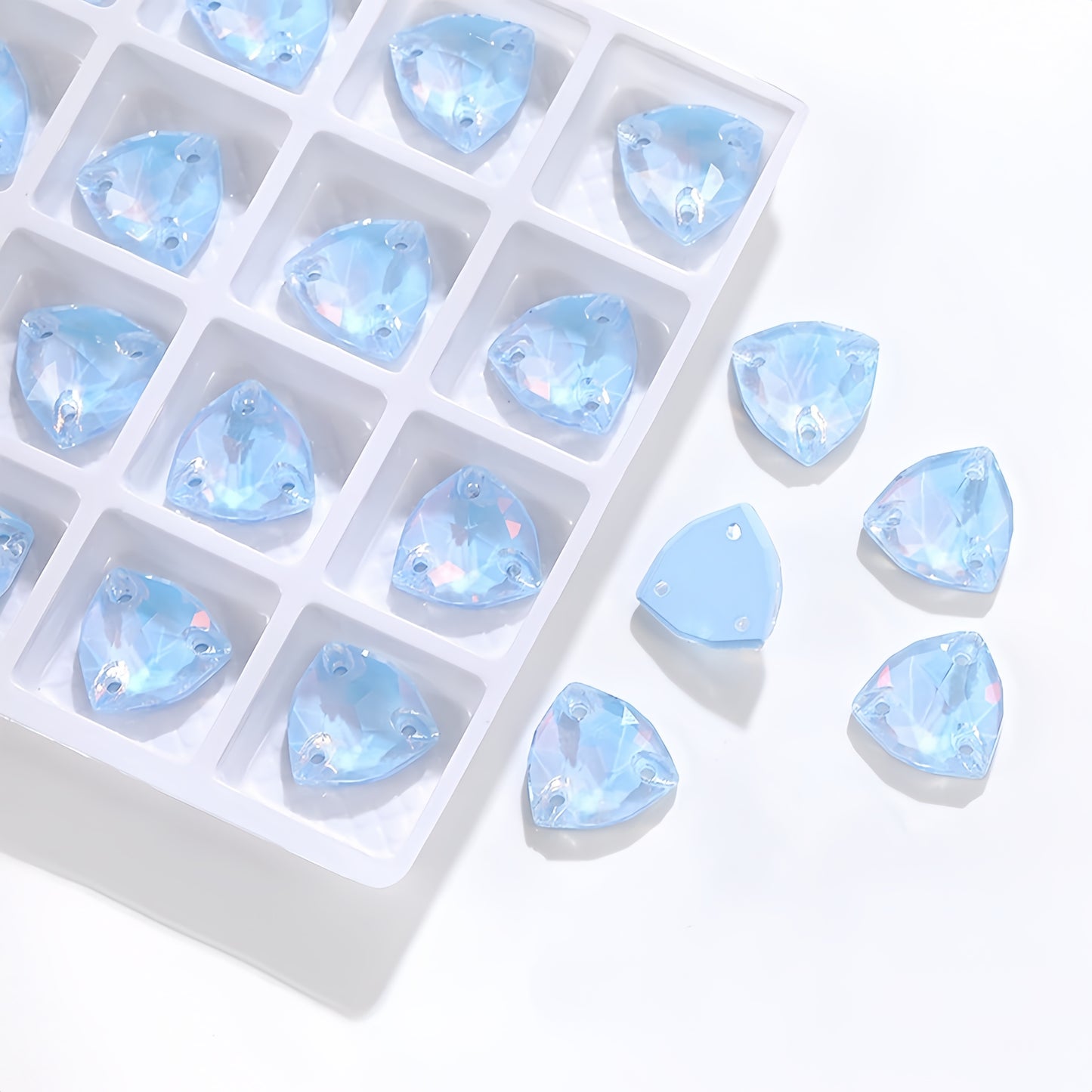 K9 Lt. Sapphire Phantom AM Trilliant Shapes